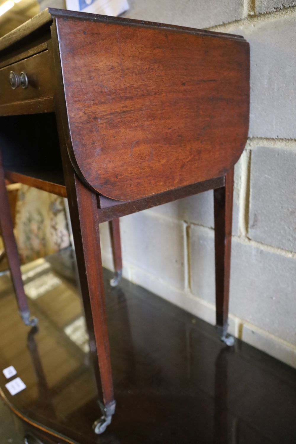 A drop flap table, width 52cm depth 41cm height 71cm